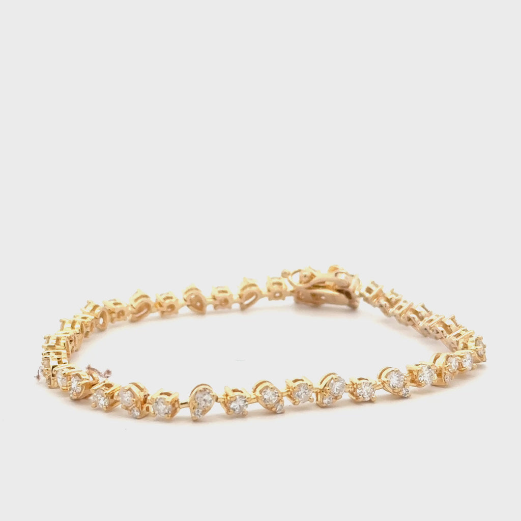 Pear Shape & Round Diamond Tennis Bracelet (2.50 ct.) in 14K Gold