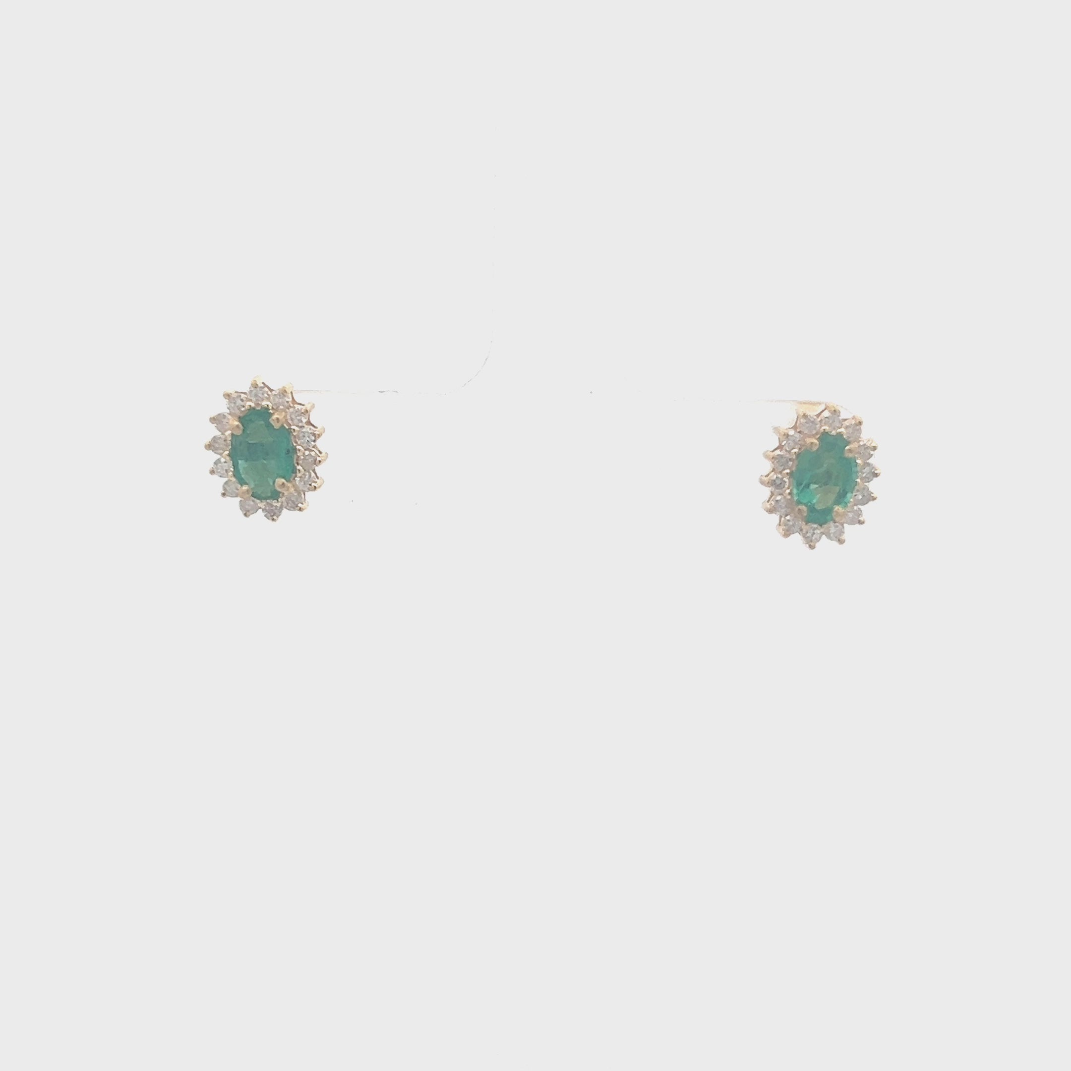 Emerald Oval Shape With Halo Diamonds Studs Earrings (1.10 ct.) in 14K Gold