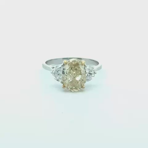 Lab Grown Diamond (3.80 ct.) Fancy Yellow Oval Cut 3-Stones Setting Engagement Ring in 14K Gold