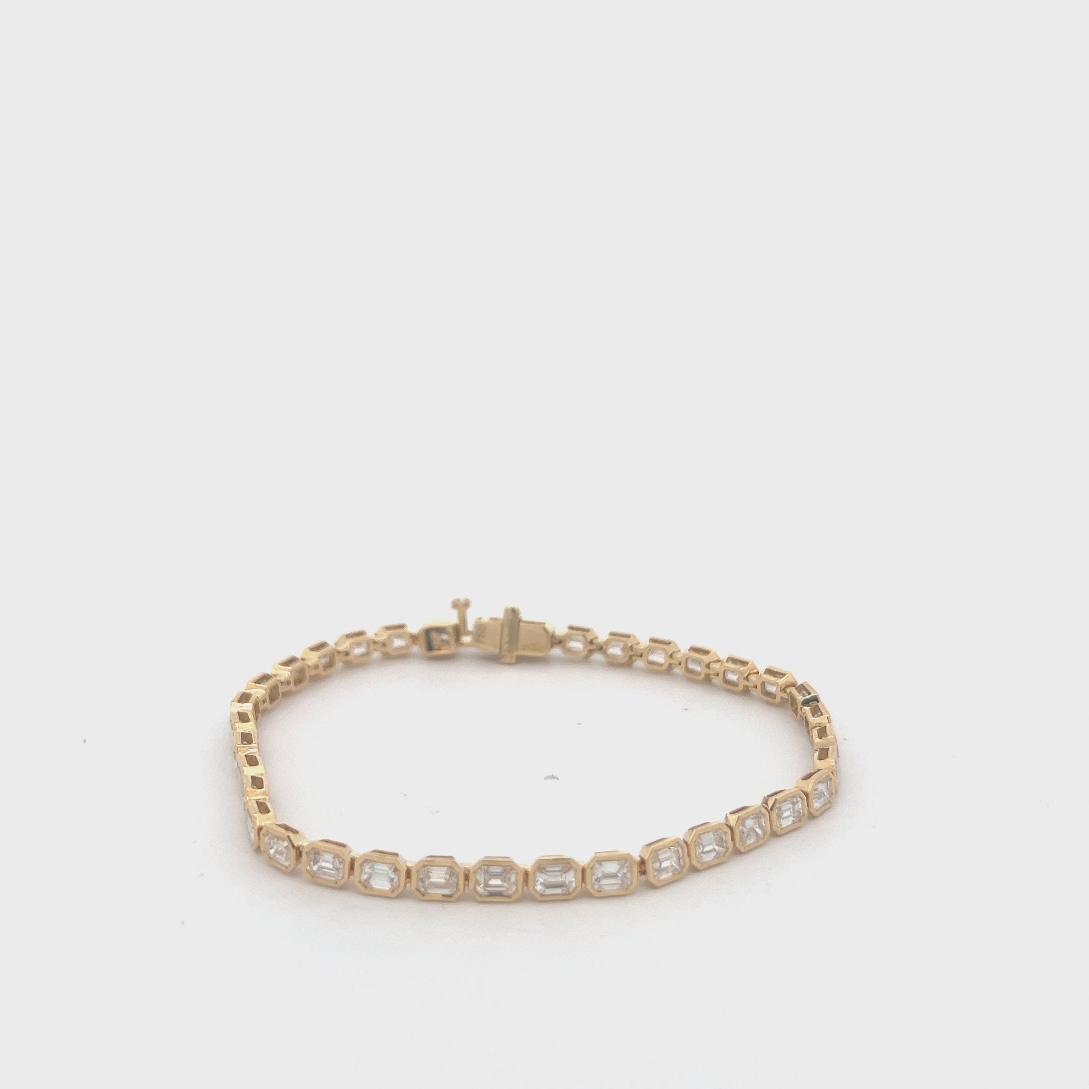 Emerald Cut Diamond Tennis Bracelet (5.31 ct.) Bezel Set in 18K Gold