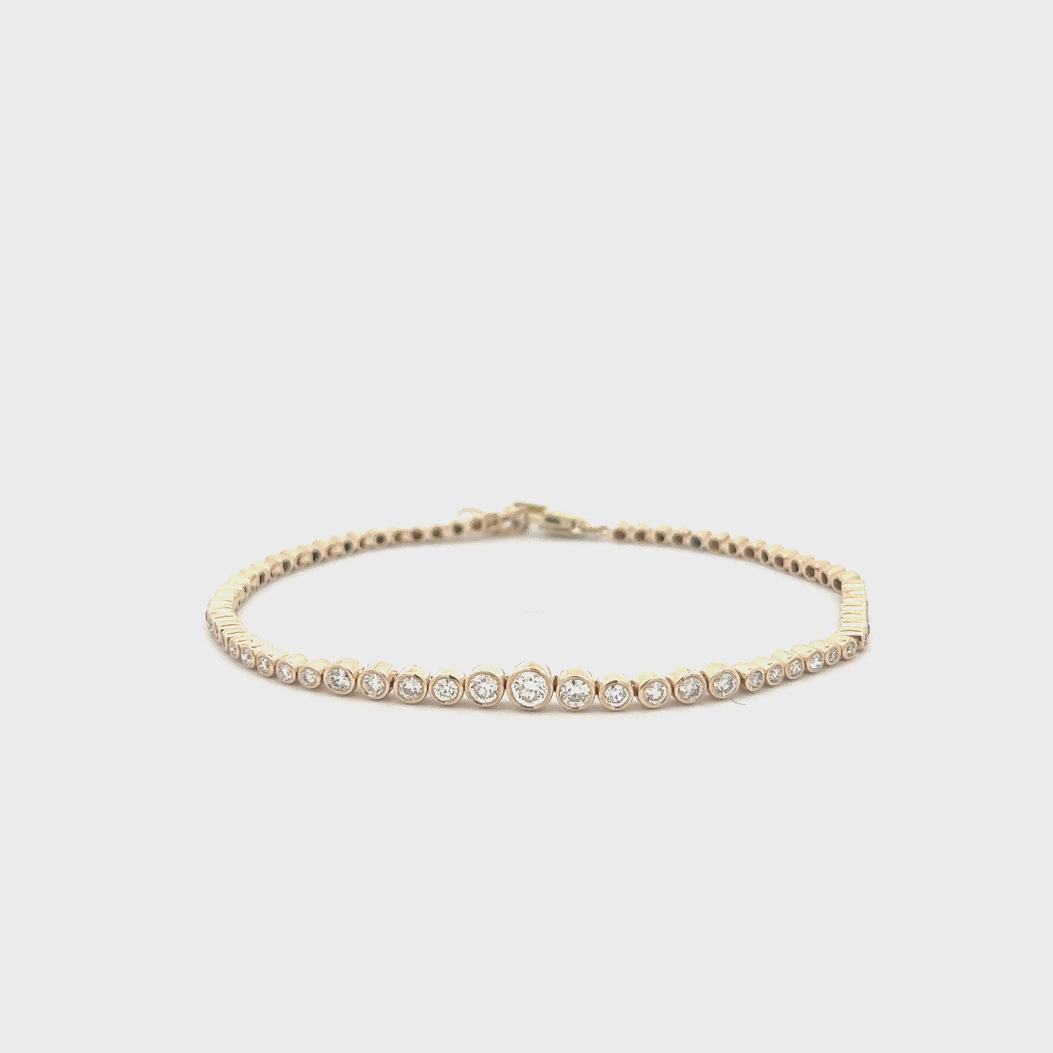 Half Way Graduated Diamond Tennis Bracelet (0.80 ct.) Bezel Set in 14K Gold