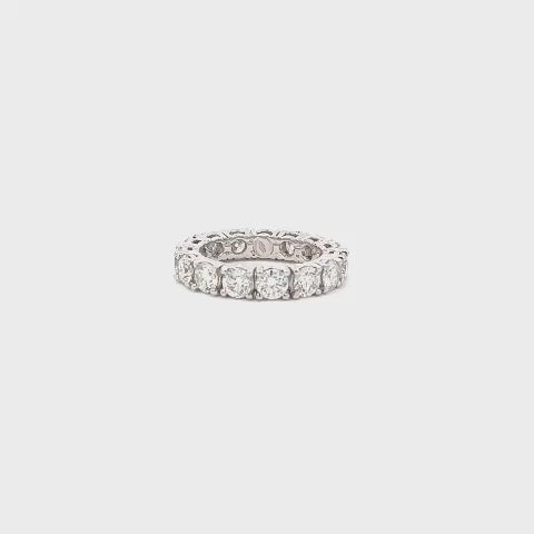 Made in Italy Band ring in 18k white gold with a full circle of round brilliant diamonds. 3 mm wide. Carat total weight 1.80.  Gold: 18K Total Carat Weight: 4.68 Weight:  g 5.43 Diamond Cut: Brilliant Made in Italy an-aiii-907