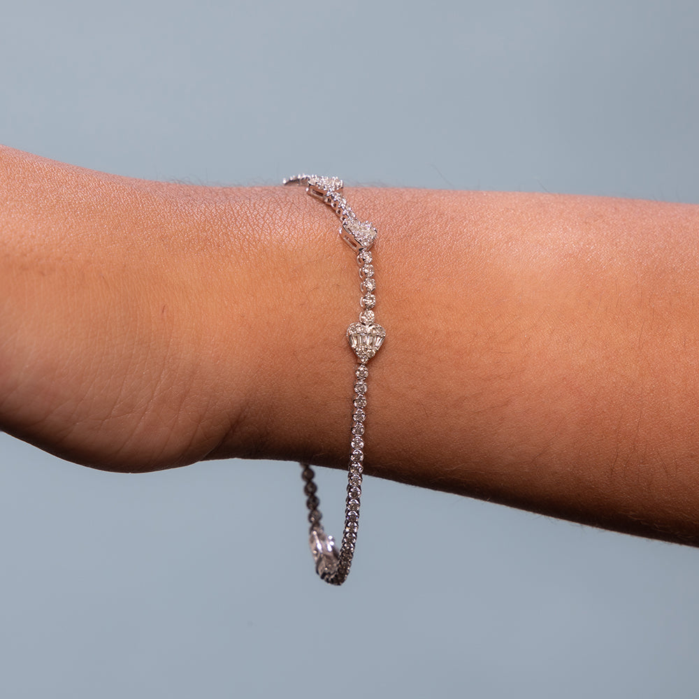 Round and Baguette Diamonds Heart Shape Tennis Bracelet (1.15 ct.) in 14K Gold
