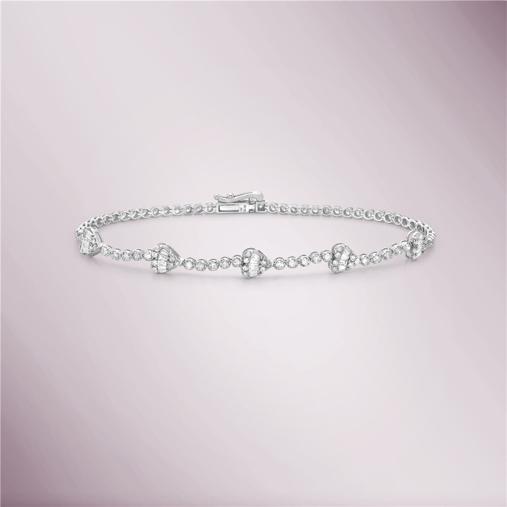 Round and Baguette Diamonds Heart Shape Tennis Bracelet (1.15 ct.) in 14K Gold