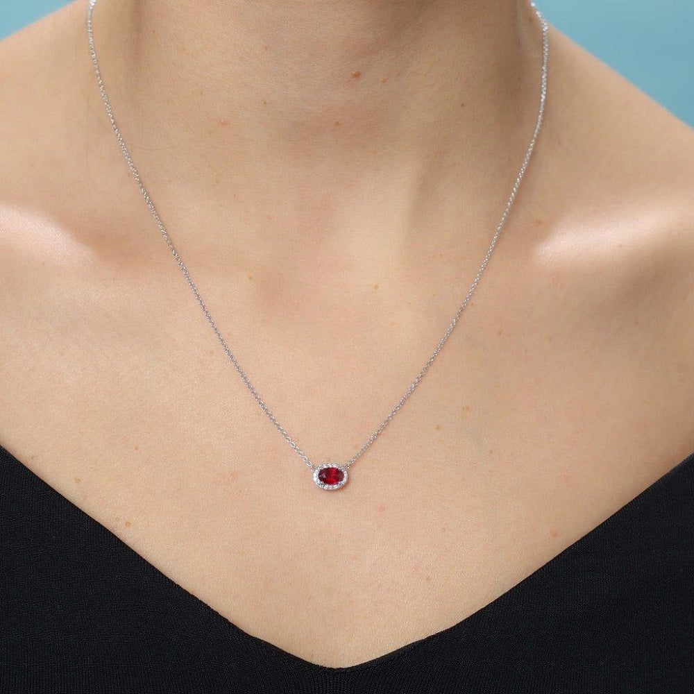 Oval Red Ruby With Diamond Halo Necklace (0.59 ct.) in 18K Gold