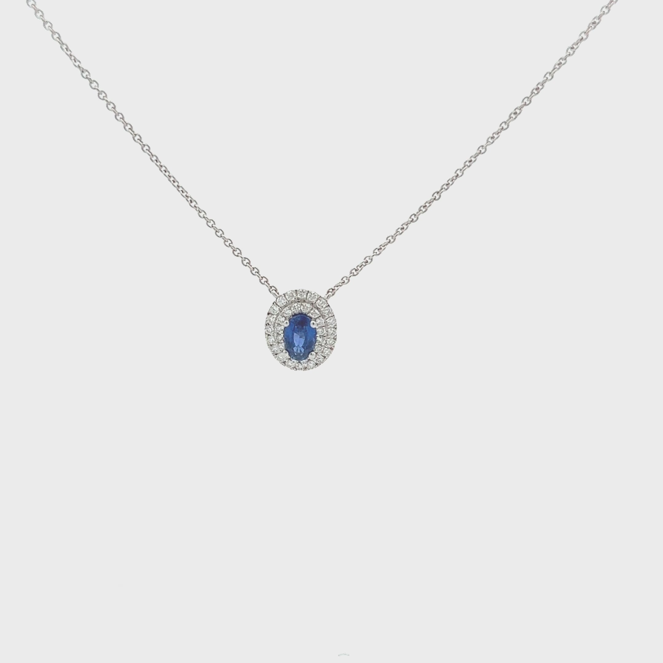 Oval Blue Sapphire With Diamond Double Halo Necklace (0.73 ct.) in 18K Gold